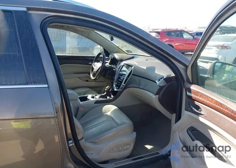 2014 Cadillac Srx Luxury Collection z USA, uszkodzony, nr VIN 3GYFNBE39ES561320